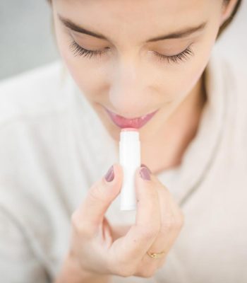 woman-applying-lip-balm.jpg